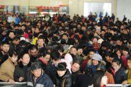A new online system for ordering train tickets in China is struggling to cope with the huge demand
