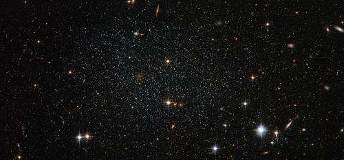 Antlia dwarf galaxy peppers the sky with stars