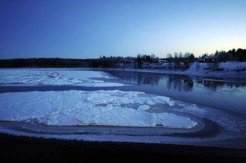 A partially frozen river is pictured at dawn near Kittilae in Lapland, Finland, in 2008
