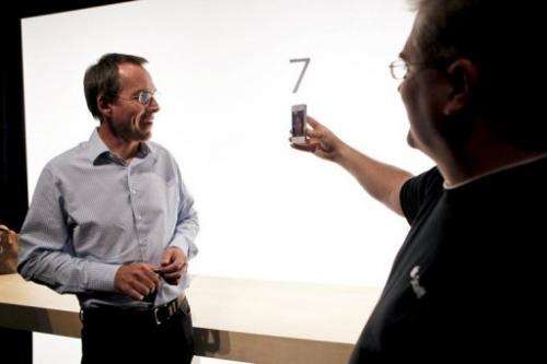 Apple employees demonstrate Facetime, a video chat application