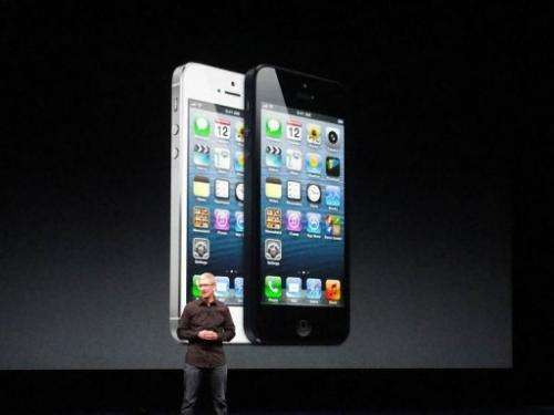 Apple's CEO Tim Cook presents the new iPhone 5