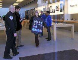 A protester leaves the Apple store in Washington, DC