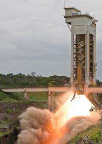 Ariane 5 booster roars into life