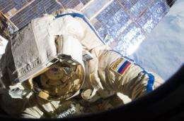 A Russian cosmonaut participates in a session of extravehicular activity on the Russian segment of the ISS