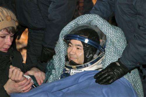 Astronauts touch down in chilly Kazakhstan steppe