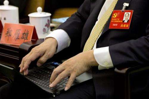 At Mao-style conclave, China embraces Twitter age