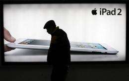 Bankruptcy threat to iPad trademark challenger (AP)