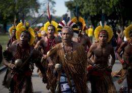 Brazilian Pataxo natives sing at the People's Summit in Rio de Janeiro