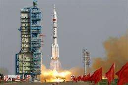 Chinese spacecraft en route to orbiting module