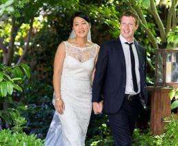Day after historic IPO, Facebook's Zuckerberg weds (AP)