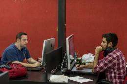 Designers create games for mobile devices at Brazilian outsourcing company Ci&T in Campinas, Brazil in September 2012