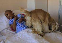 Dogs give emotional boost to sick kids in Quito