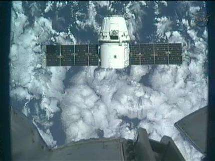 Dragon arrives at space station in historic 1st (AP)