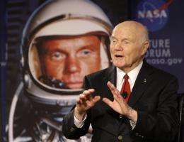 Glenn chats with space station to mark anniversary (AP)