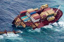 Half of the grounded container ship 'Rena' is seen in the Bay of Plenty