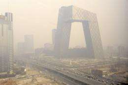 Haze covers the new China Central Television headquarters building in Beijing on March 2