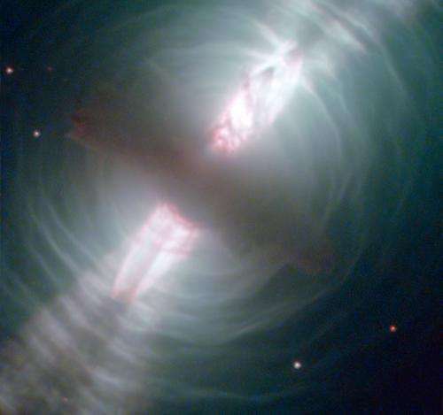 Hubble images searchlight beams from a preplanetary nebula