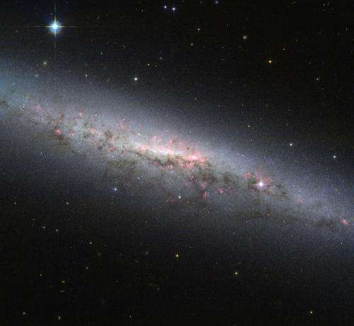 Hubble sees an actively star-forming galaxy, NGC 7090