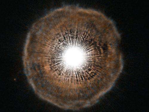 Hubble sees red giant blow a bubble