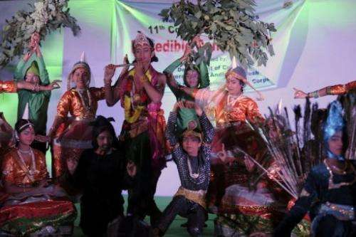 Indian artists perform a traditional dance at a cultural event during the Convention on Biodiversity