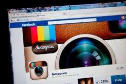 Instagram's fan page is seen on Facebook