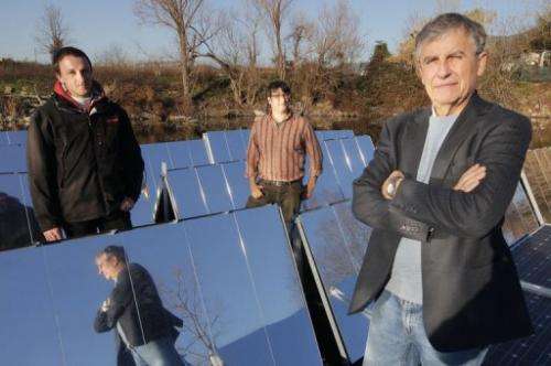 Marco Rosa-Clot (R) and his team of engineers have built a cost-effective prototype for floating, rotating solar panels
