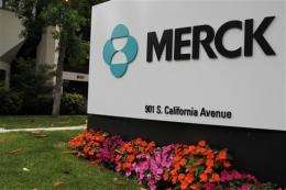 Merck's 2Q net falls on charges, but sales rise