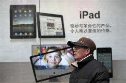 More Chinese cities seize iPads over trademark (AP)