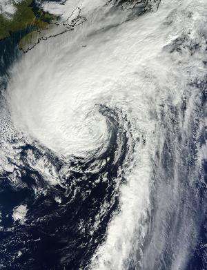 NASA catches last image of Rafael as a hurricane, now merged with front