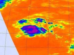 NASA view of Atlantic's Tropical Depression 19 shows backwards 'C' of strong storms