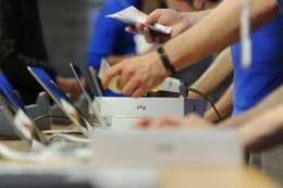 New iPads are stacked on a counter at an Apple store in central London in March 2012 on the first day of their release