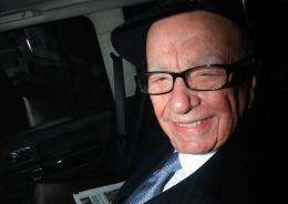 News Corporation chief executive Rupert Murdoch leaves his London home
