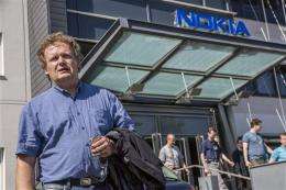 Nokia cuts 10,000 jobs, streamlines to save costs