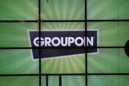 Online shopping deals giant Groupon on Monday posted a sound quarterly profit but saw its stock tumble nearly 20 percent