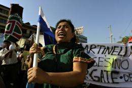 Panamanian natives shout slogans during a protest against the government in Panama City on February 5