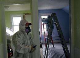Panel urges lower cutoff for child lead poisoning (AP)