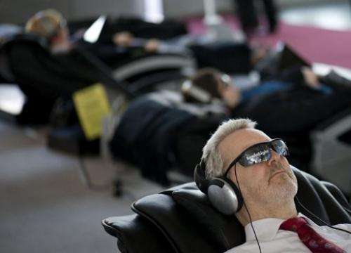 People get the "brain light" treatment at the world's biggest high-tech fair, the CeBIT