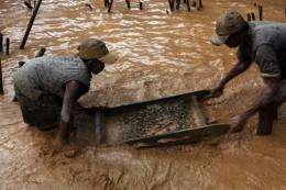 People work at the sapphire mine in Didy, Madagascar