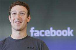 Pew study: Facebook users get more than they give (AP)