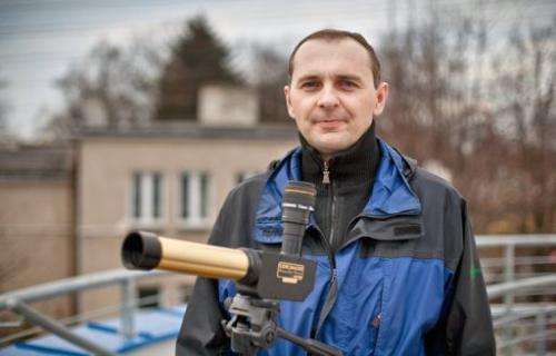 Rafal Laskowski,  a teacher in a school of Jablonowo, standing on the terrace of the village's Astrobase