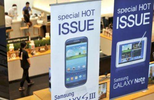 Signboards of Samsung Electronics' Galaxy S3 and Galaxy Note 10.1, pictured at a showroom in Seoul, on August 24, 2012