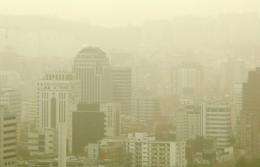 Skyscrapers in downtown Seoul are shrounded by yellow dust storms blowing in from China's Gobi desert