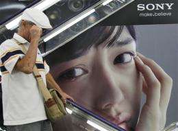 Sony's loss grows, cuts earnings forecast