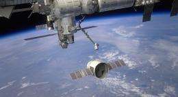 Space station crew anticipating SpaceX dragon’s arrival