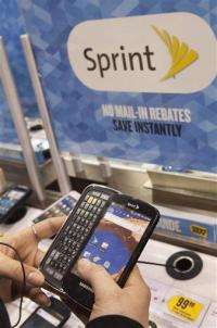 Sprint posts deeper 4Q loss on iPhone costs (AP)