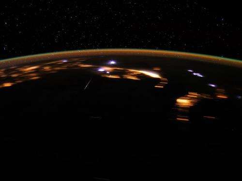 Stunning lyrid meteor over earth at night