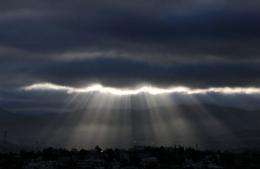 Sun rays appear through the clouds