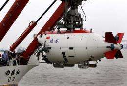 The Chinese submersible "Jiaolong" is lifted into the Huanghai sea in Jiangyin in 2011