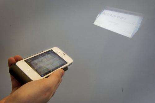 The company Assmann shows an Iphone jacket with a built in projector at the world's biggest high-tech fair,  CeBIT