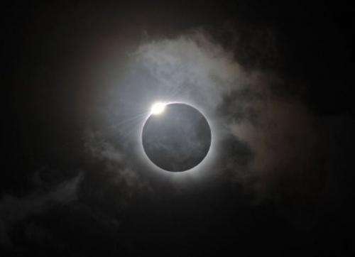 The Diamond Ring effect is shown following totality of the solar eclipse at Palm Cove in Australia